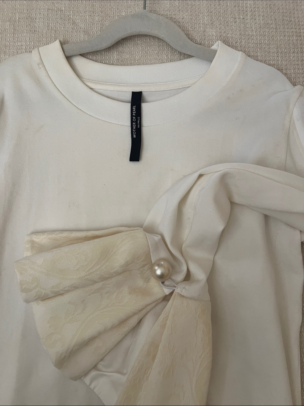 Mother of Pearl Ivory Top with Pearl-Embellished Bow